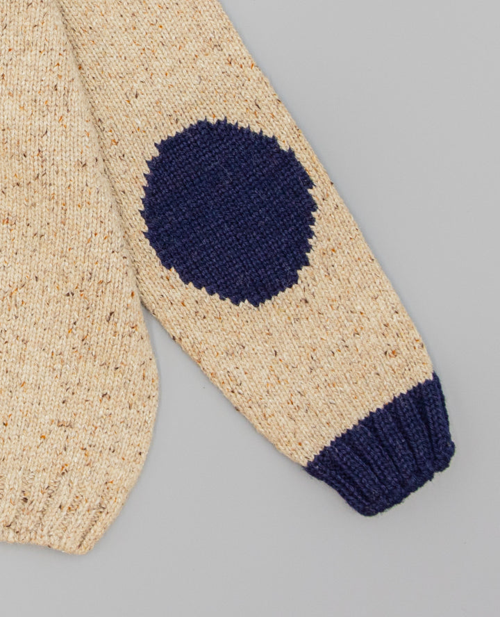 JERSEY BEIGE CON DETALLES AZUL MARINO