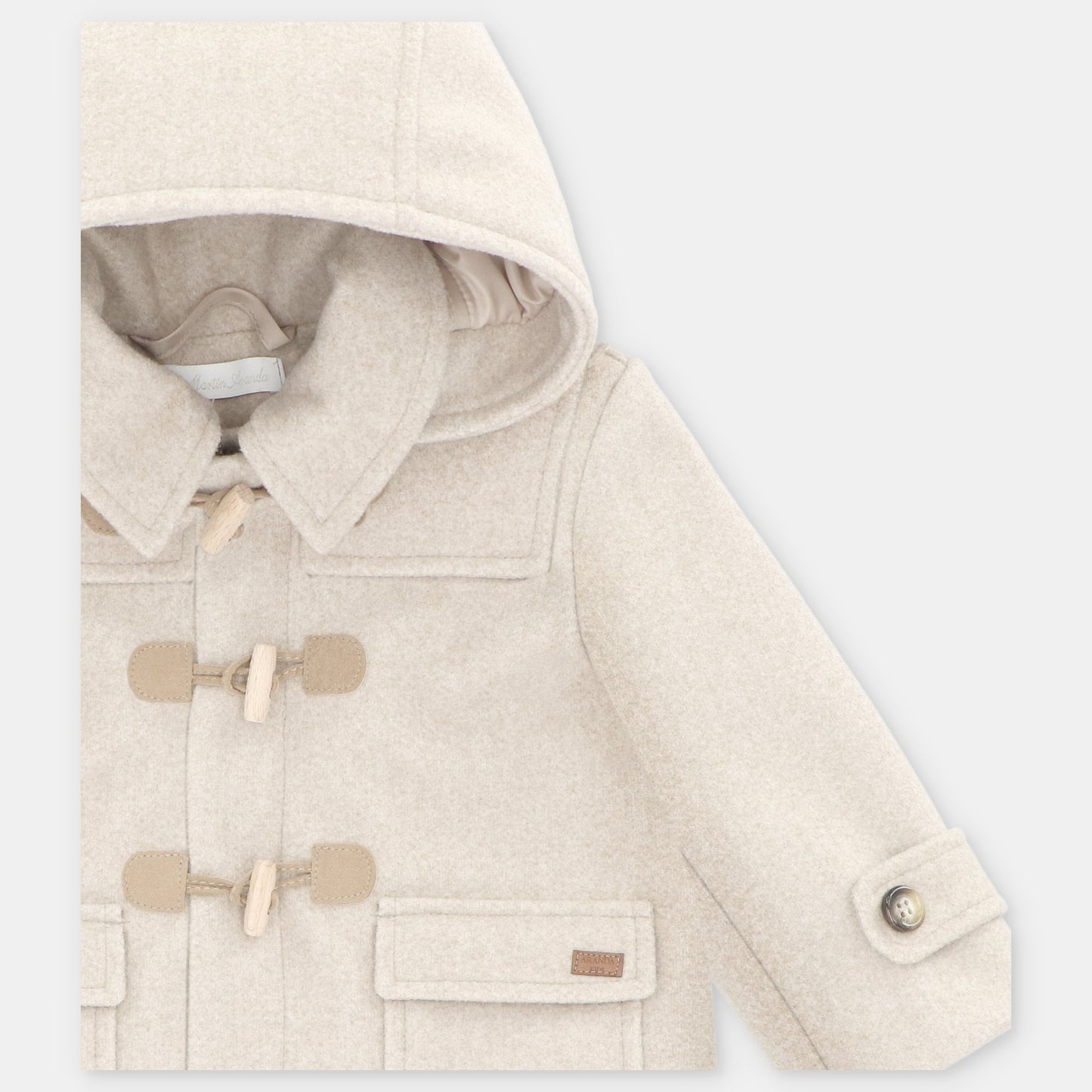 TRENKA CON CAPUCHA TELA